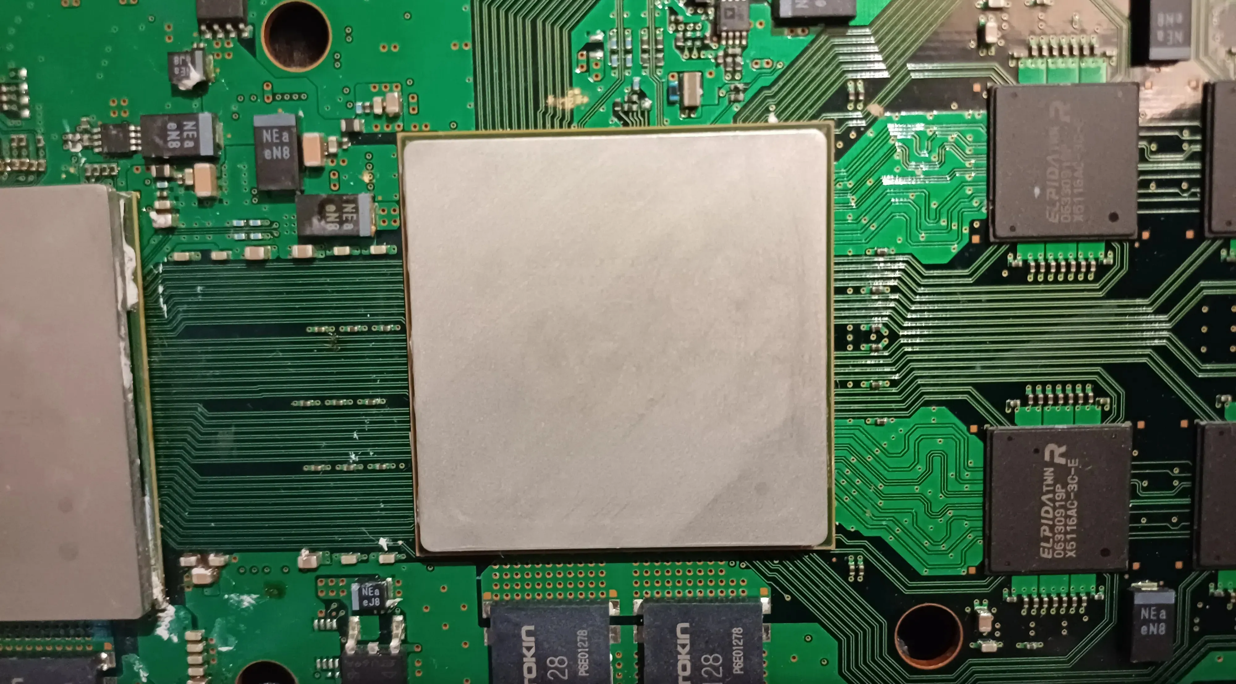 A close up image of the Cell Broadband Engine chip on a Motherboard