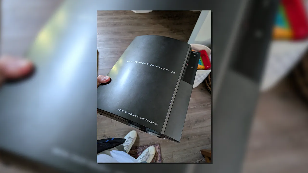 Holding a MGS4 special edition PS3
