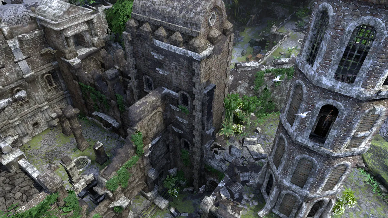 A crumbling stone ruin in a lush jungle