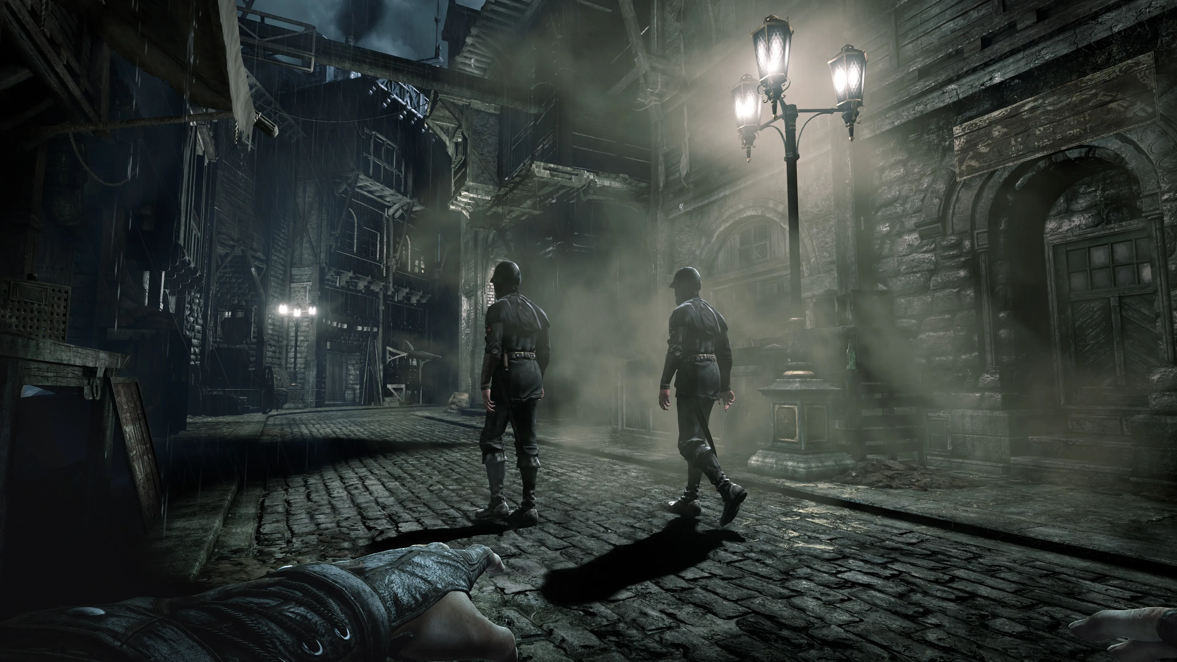 Two guards walking a cobblestone street