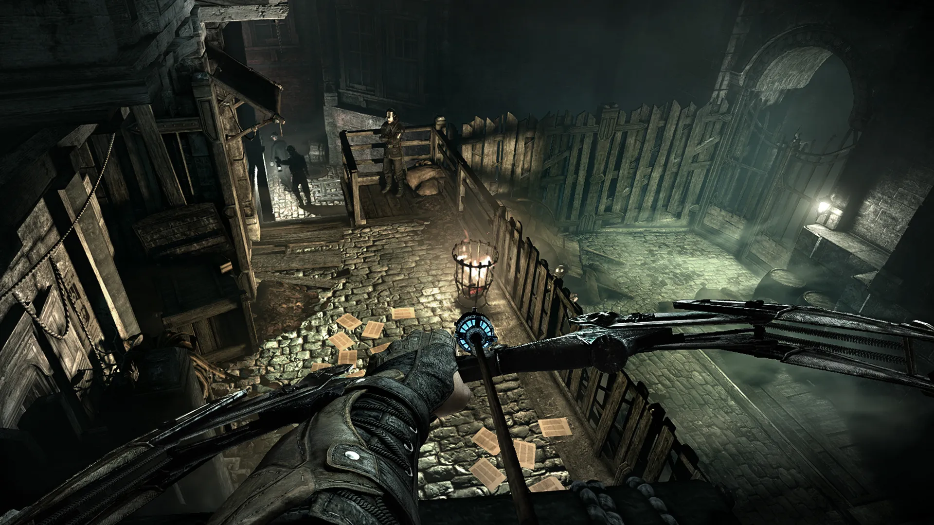 A bow and arrow pointing at a lit fire